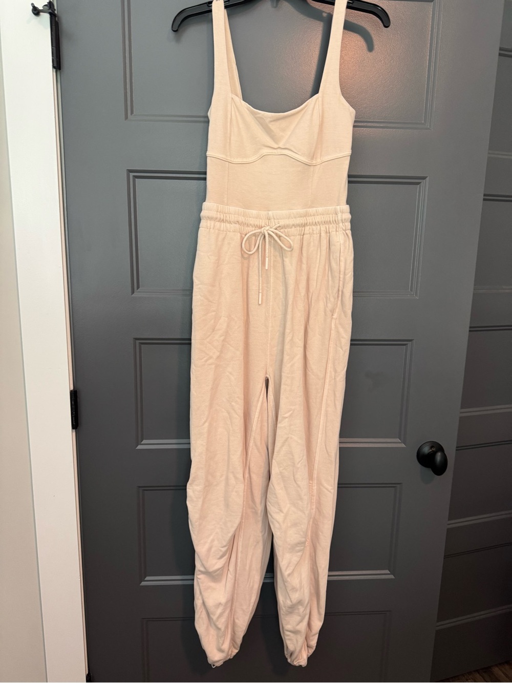 FP Movement by Free People Soft Cream Sleeveless Drawstring Jumpsuit